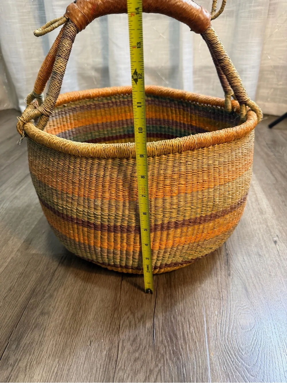 Large handmade vintage shopping basket with a leather handle.